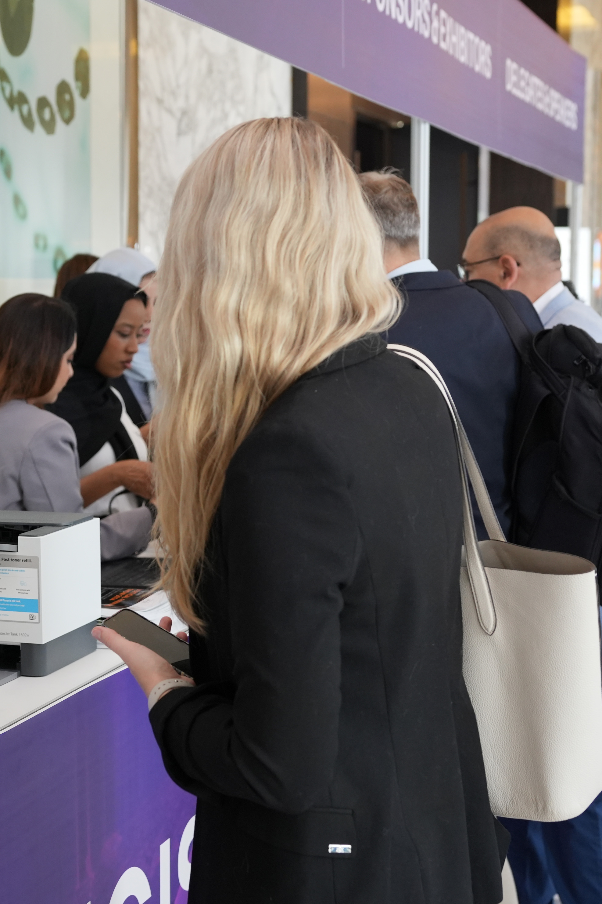 Visitors at the Registration Desk